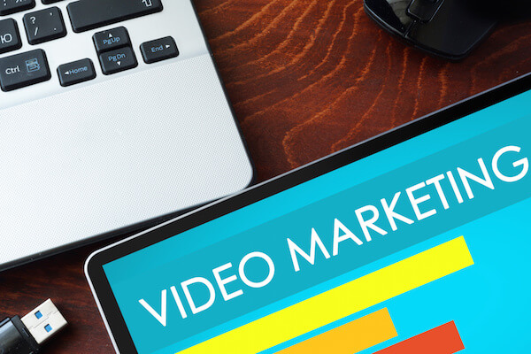tablet with video marketing words